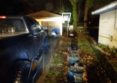 dark house and truck at night